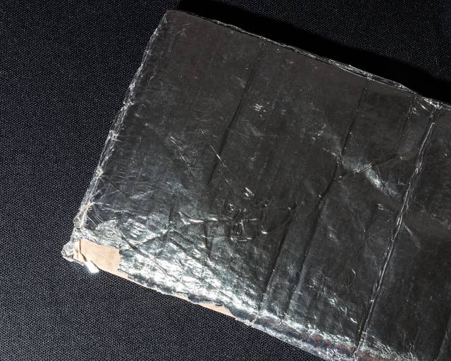 Aluminum peeling off the cardboard
