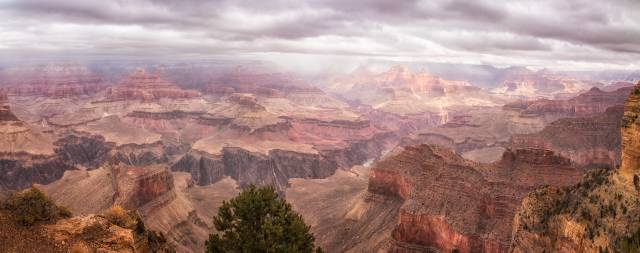 Grand canyon close to the village with clouds above the canyon