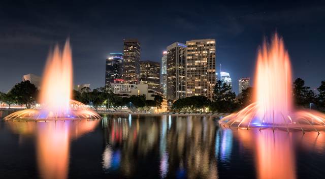 The famous Los Angeles skyline with fountains in the foreground